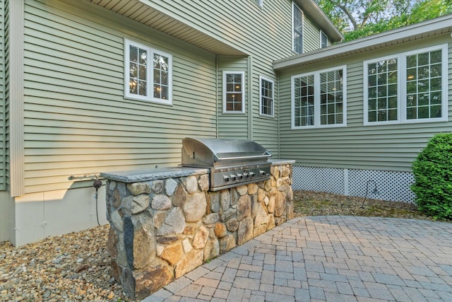104 Windsor Dr, Auburn, NH 03032 - view of patio / terrace with an outdoor kitchen