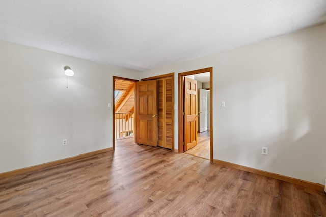 26 Old Mill Rd, Ossipee, NH 03890 - empty room featuring light wood-style floors and baseboards
