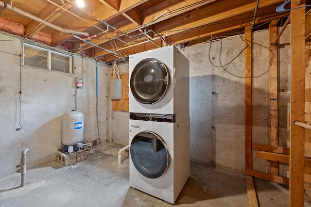26 Old Mill Rd, Ossipee, NH 03890 - laundry room featuring stacked washer and clothes dryer