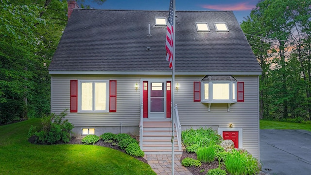329 Peverly Rd, Northfield, NH 03276 - view of front of house featuring a shingled roof, a chimney, a lawn, and entry steps