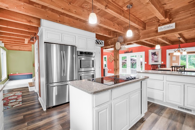 329 Peverly Rd, Northfield, NH 03276 - kitchen with stainless steel appliances, a wooden ceiling with exposed beams, french doors, dark wood-style flooring, and a kitchen island