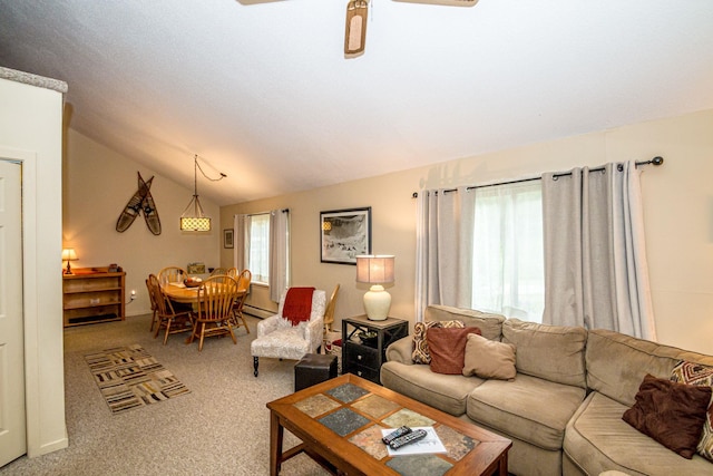 11E- Seasons Of Attitash Rd Unit E, Bartlett, NH 03812 - living area with carpet, lofted ceiling, ceiling fan, and a baseboard heating unit