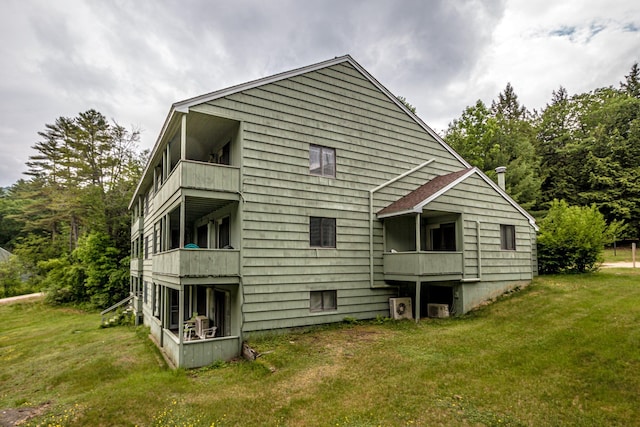 11E- Seasons Of Attitash Rd Unit E, Bartlett, NH 03812 - back of house featuring a balcony and a yard