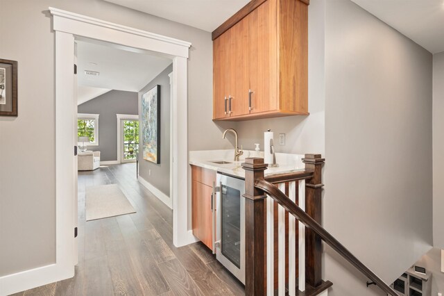 5 Michaels Way, Laconia, NH 03246 - indoor wet bar with beverage cooler, dark wood-type flooring, and lofted ceiling