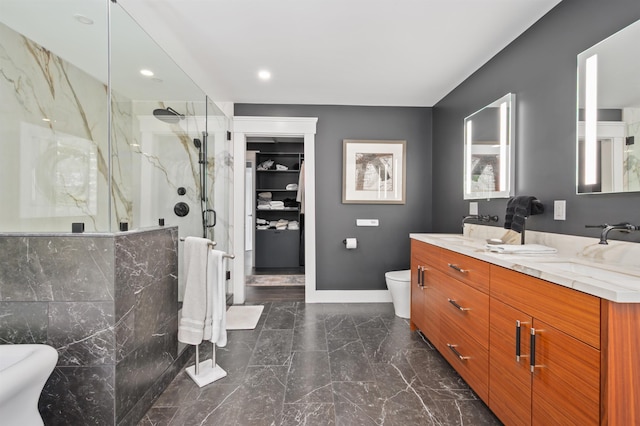 5 Michaels Way, Laconia, NH 03246 - bathroom with a marble finish shower, marble tiled flooring, double vanity, and recessed lighting