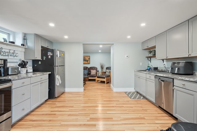 5 Michaels Way, Laconia, NH 03246 - kitchen with stainless steel appliances, gray cabinets, light wood-type flooring, recessed lighting, and open shelves