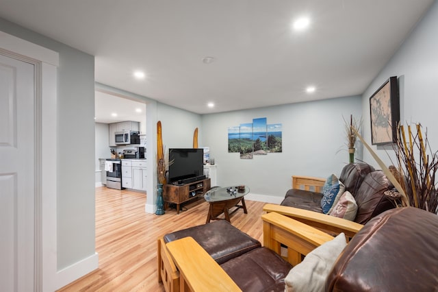 5 Michaels Way, Laconia, NH 03246 - living room featuring light wood-style floors and recessed lighting