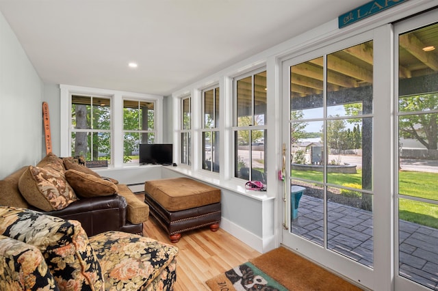 5 Michaels Way, Laconia, NH 03246 - sunroom / solarium featuring wood finished floors and a baseboard heating unit