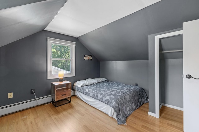 46 E Diane Dr, Keene, NH 03431 - bedroom featuring a baseboard radiator, wood finished floors, and lofted ceiling