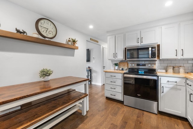 46 E Diane Dr, Keene, NH 03431 - kitchen featuring appliances with stainless steel finishes, open shelves, tasteful backsplash, recessed lighting, and white cabinets