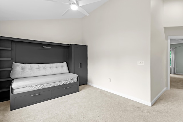 243 Drakeside Rd Unit 7, Hampton, NH 03842 - unfurnished bedroom with light colored carpet, lofted ceiling, and a ceiling fan