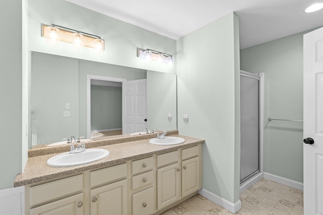 243 Drakeside Rd Unit 7, Hampton, NH 03842 - full bathroom with double vanity, a shower stall, and tile patterned floors