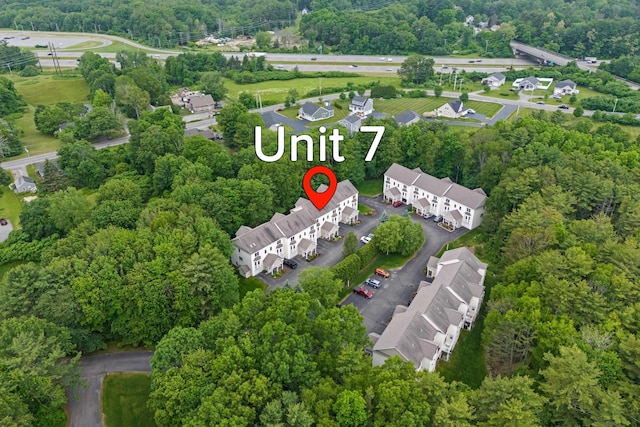 243 Drakeside Rd Unit 7, Hampton, NH 03842 - view of property location with a heavily wooded area