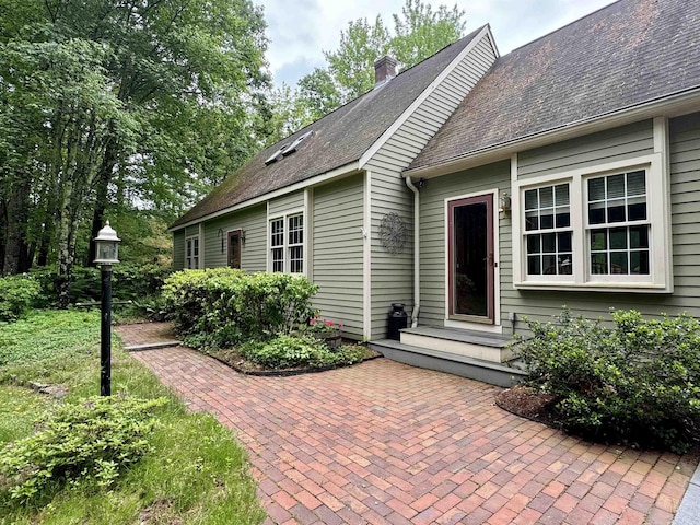 114 Snow Pond Rd, Concord, NH 03301 - doorway to property featuring a chimney