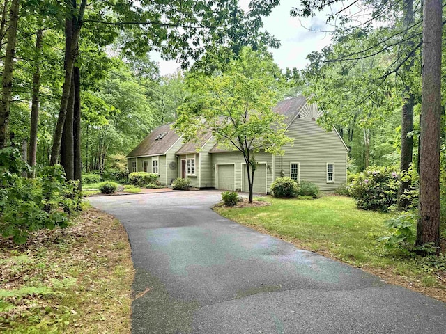 114 Snow Pond Rd, Concord, NH 03301 - view of front of home featuring driveway, a garage, and a front yard