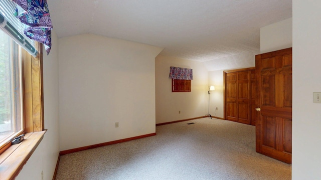 114 Snow Pond Rd, Concord, NH 03301 - unfurnished room featuring light colored carpet and vaulted ceiling