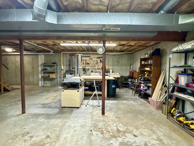 114 Snow Pond Rd, Concord, NH 03301 - unfinished below grade area featuring a workshop area