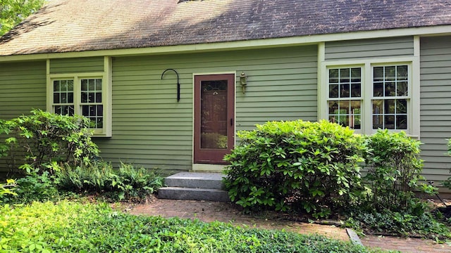 114 Snow Pond Rd, Concord, NH 03301 - doorway to property with roof with shingles
