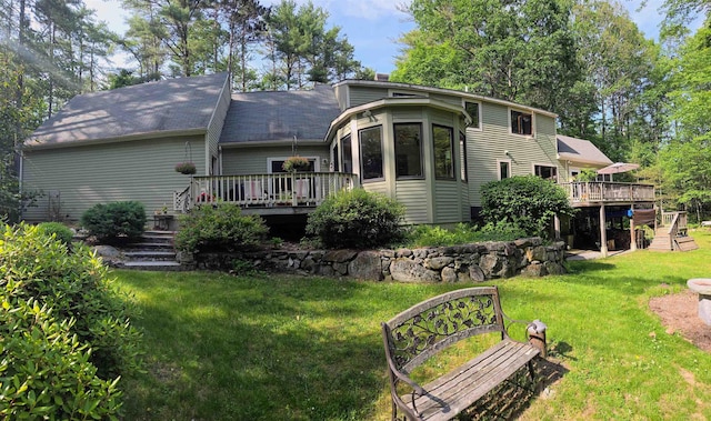 114 Snow Pond Rd, Concord, NH 03301 - back of house featuring a wooden deck, stairs, a lawn, and a chimney