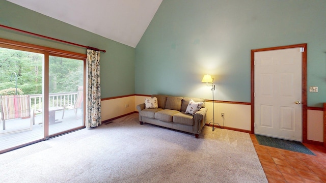 114 Snow Pond Rd, Concord, NH 03301 - carpeted living area featuring high vaulted ceiling and tile patterned flooring