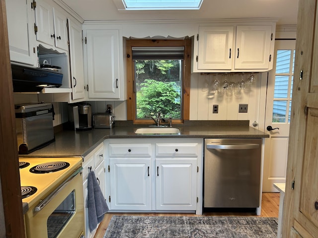 352 S Shore Rd, New Durham, NH 03855 - kitchen with stainless steel dishwasher, dark countertops, white electric range oven, and wood finished floors