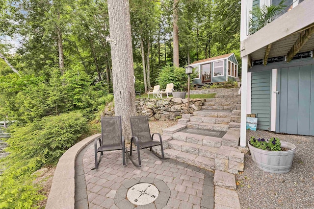 352 S Shore Rd, New Durham, NH 03855 - view of patio / terrace featuring a sunroom