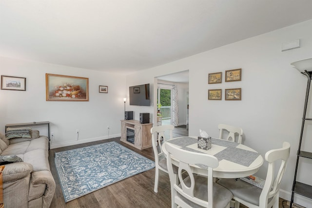 44A Windham Rd, Hudson, NH 03051 - dining room with wood finished floors and baseboards