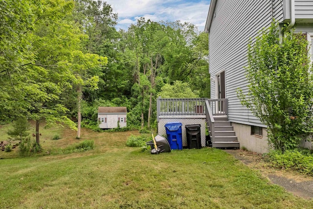 44A Windham Rd, Hudson, NH 03051 - view of grassy yard with a storage unit and a wooden deck
