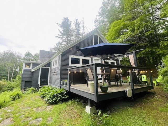 33 Newbury Heights Rd, Newbury, NH 03255 - rear view of house with a deck