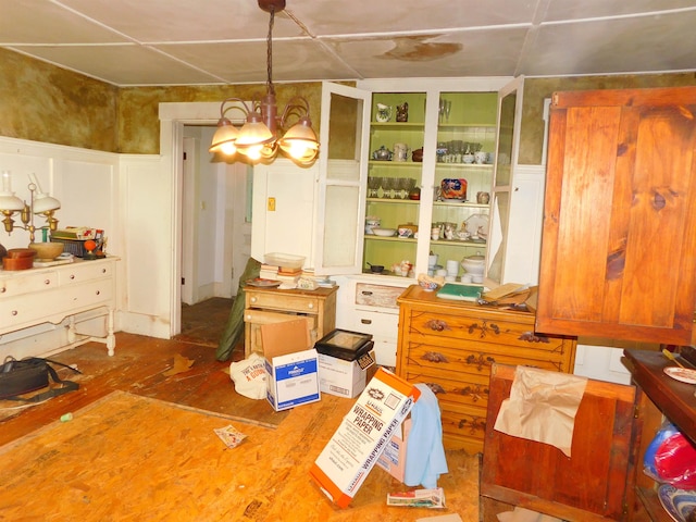 336 Main St, Wakefield, NH 03887 - dining area featuring a chandelier and wood finished floors