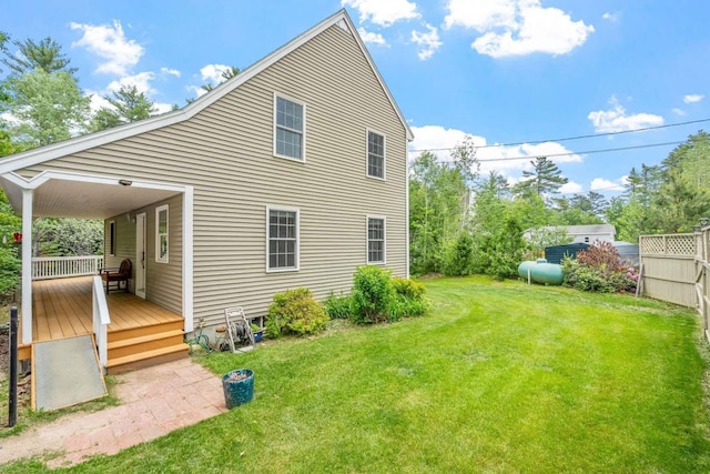 82 Robinhood Rd, Wakefield, NH 03830 - rear view of property featuring a yard and a deck