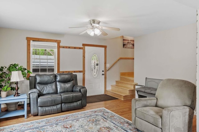 82 Robinhood Rd, Wakefield, NH 03830 - living area featuring ceiling fan, stairway, and wood finished floors
