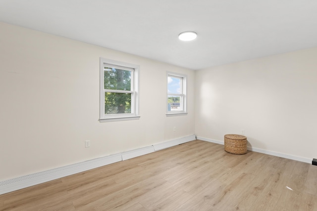 15 Wildflower Dr, Concord, NH 03303 - unfurnished room with wood finished floors and baseboard heating