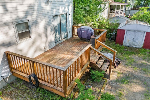 15 Wildflower Dr, Concord, NH 03303 - deck featuring a grill and a storage shed