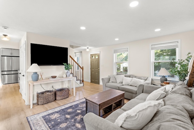 15 Wildflower Dr, Concord, NH 03303 - living area with stairway, light wood-style floors, and recessed lighting