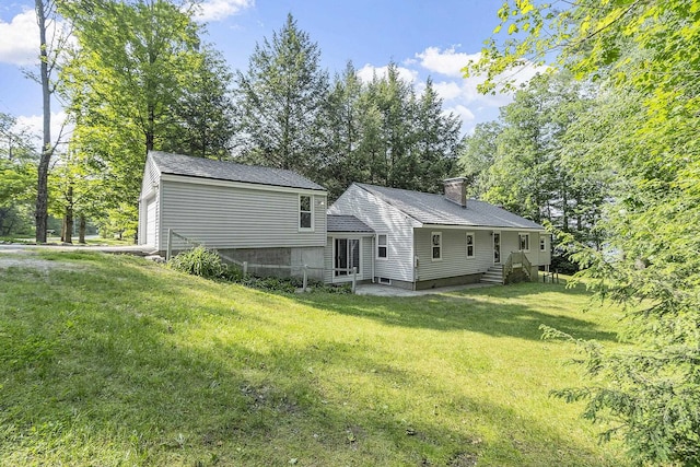 27 Mason Rd, Brookline, NH 03033 - back of property featuring a chimney, a lawn, view of scattered trees, and an outdoor structure