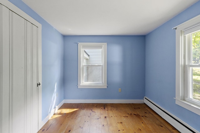 27 Mason Rd, Brookline, NH 03033 - empty room featuring baseboard heating, healthy amount of natural light, and light wood-style floors