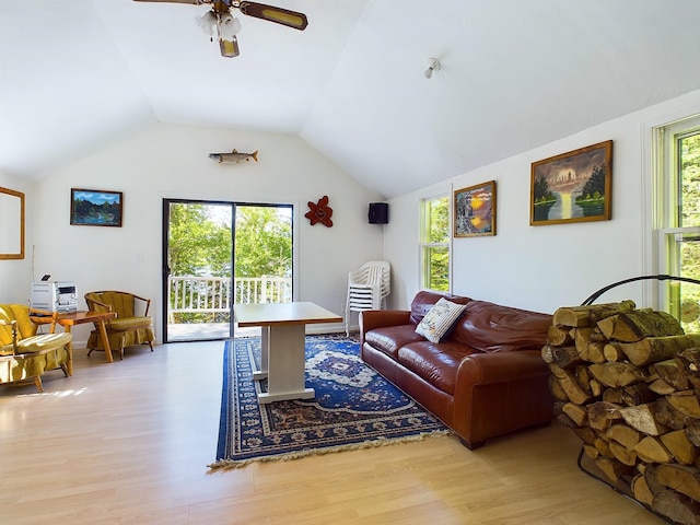 312 Roy Rd, Stewartstown, NH 03576 - living area with wood finished floors, ceiling fan, and lofted ceiling