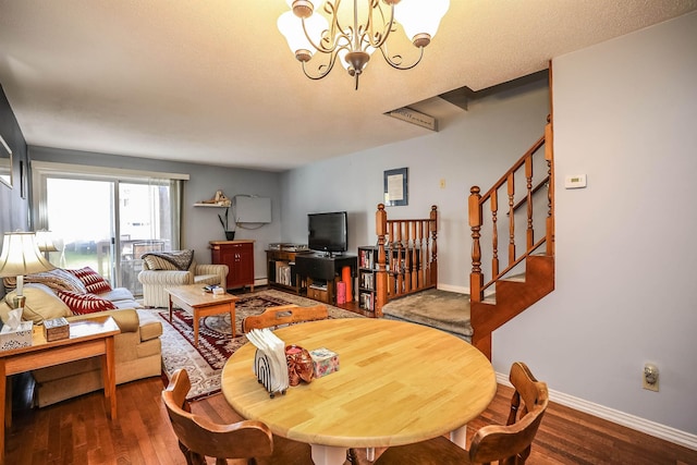 19 Shelburne Rd Unit 19, Merrimack, NH 03054 - dining space featuring a chandelier, wood finished floors, and stairway