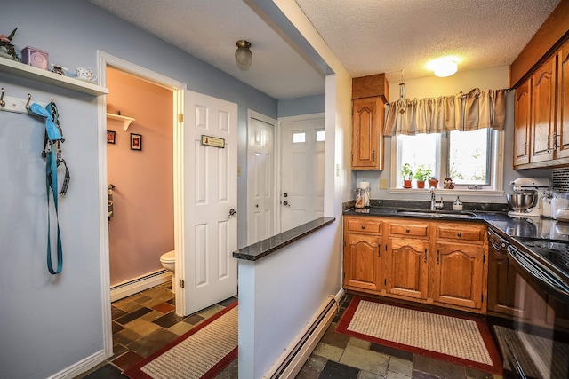 19 Shelburne Rd Unit 19, Merrimack, NH 03054 - kitchen with baseboard heating, black range with electric stovetop, brown cabinets, and a textured ceiling