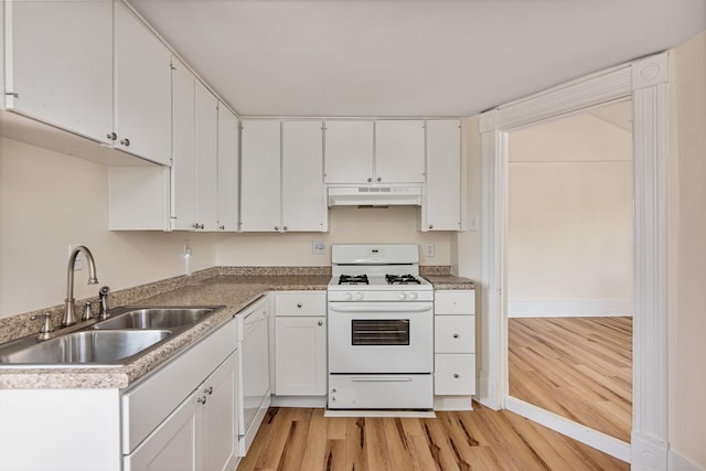 89 College St Unit A-2, Burlington, VT 05401 - kitchen with white appliances, under cabinet range hood, light wood-style floors, white cabinetry, and light countertops