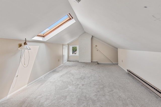 89 College St Unit A-2, Burlington, VT 05401 - bonus room with baseboard heating, a skylight, vaulted ceiling, and carpet floors