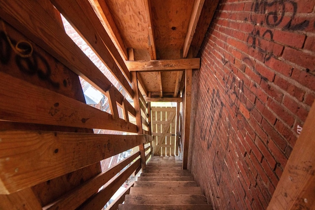 89 College St Unit A-2, Burlington, VT 05401 - stairway with brick wall