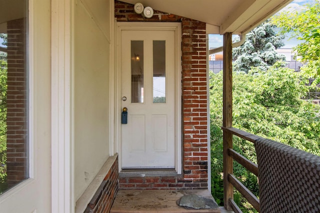 89 College St Unit A-2, Burlington, VT 05401 - doorway to property with brick siding
