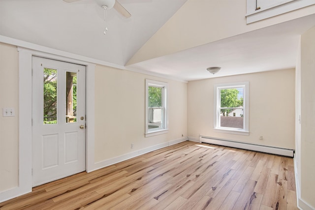 89 College St Unit A-2, Burlington, VT 05401 - foyer featuring baseboard heating, light wood-style flooring, healthy amount of natural light, a ceiling fan, and lofted ceiling