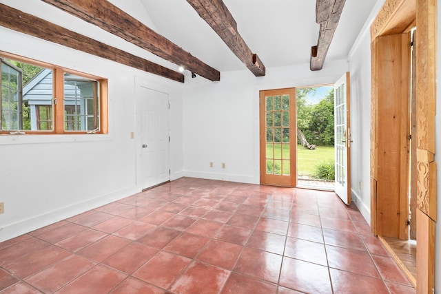526 River Rd, Lyme, NH 03768 - entryway with beamed ceiling and tile patterned floors