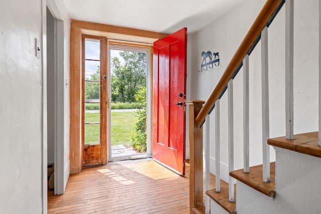 526 River Rd, Lyme, NH 03768 - foyer entrance with light wood-style flooring and stairway