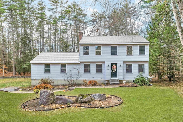 55 Trask Side Rd, Alton, NH 03810 - colonial home with entry steps, a chimney, and a front yard
