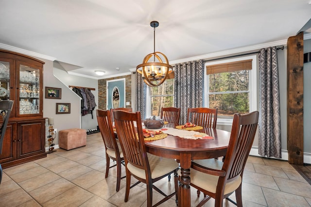 55 Trask Side Rd, Alton, NH 03810 - dining space featuring a chandelier, ornamental molding, and light tile patterned floors