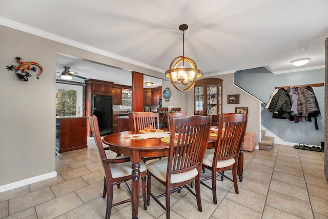 55 Trask Side Rd, Alton, NH 03810 - dining room with a chandelier, crown molding, light tile patterned floors, and stairway